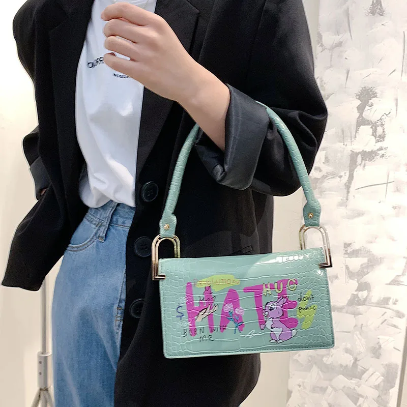 
2021 Wholesale graffiti armpit bags fashion letter korean style sling bags pu leather crocodile girls bags 