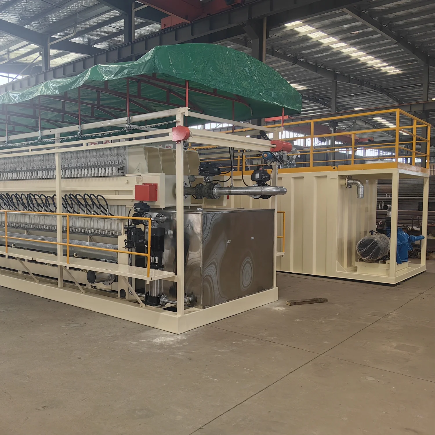 Automatic membrane filter press with belt conveyor and auto dosing flocculation device