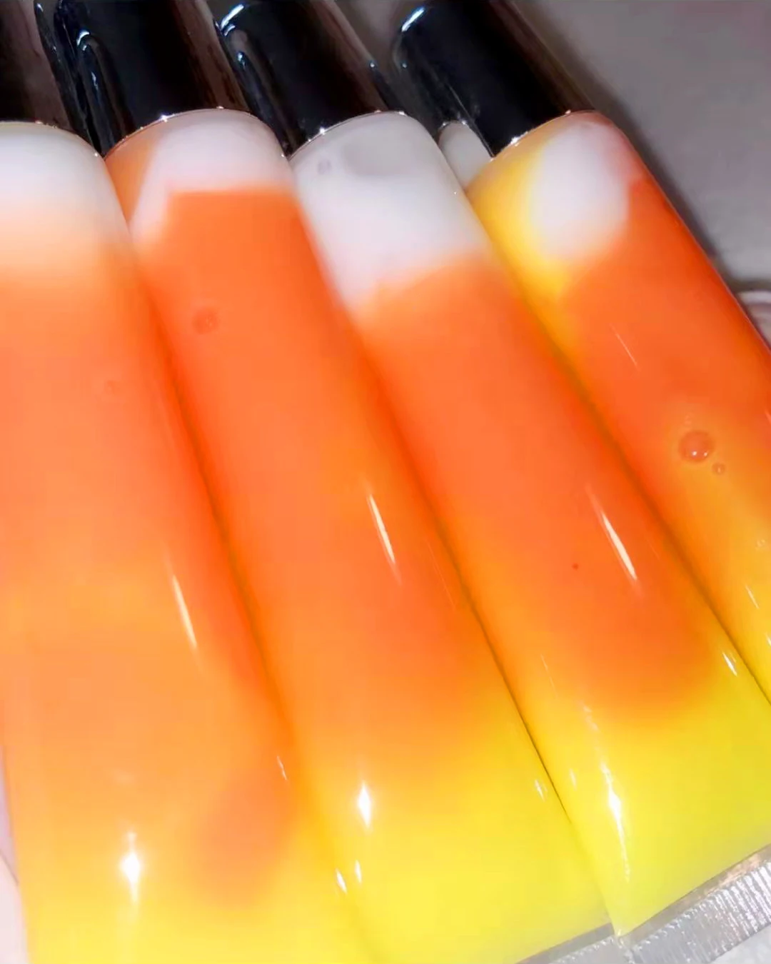 Customize latest pink 10g 15g 20g squeeze lip gloss tube private label custom empty plastic containers lip balm squeeze tubes