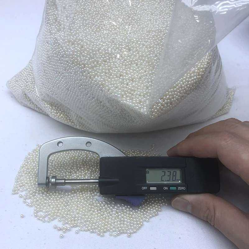 zhuji wholesale triple A grade natural freshwater pearls small,2-2.5mm,high luster,round,clean surface