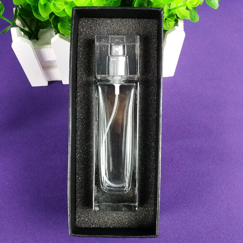 Transparent 50ml perfume bottles wholesale rectangular attar crystal bottle pump spray attar glass oil bottle