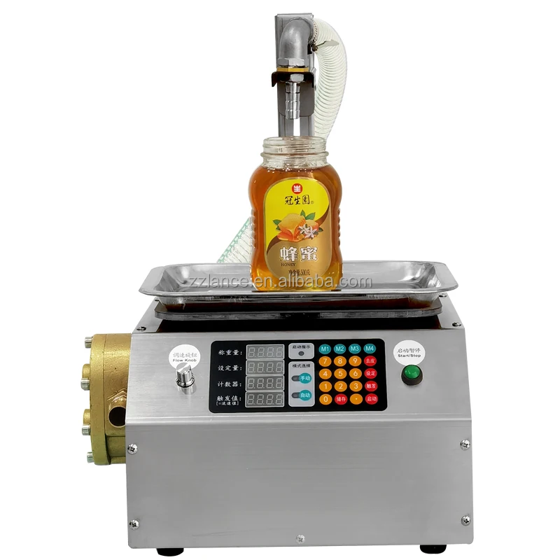 oil cartridge filling machine, 	 lube oil filling machine with weighing