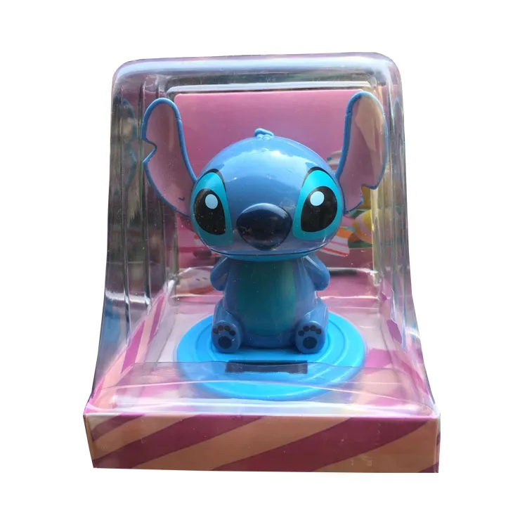 Creative car decoration smile Stitch solar cute shaking head doll car accessories