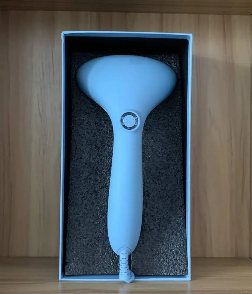 New handheld garment steamer working on clothes and household fabrics