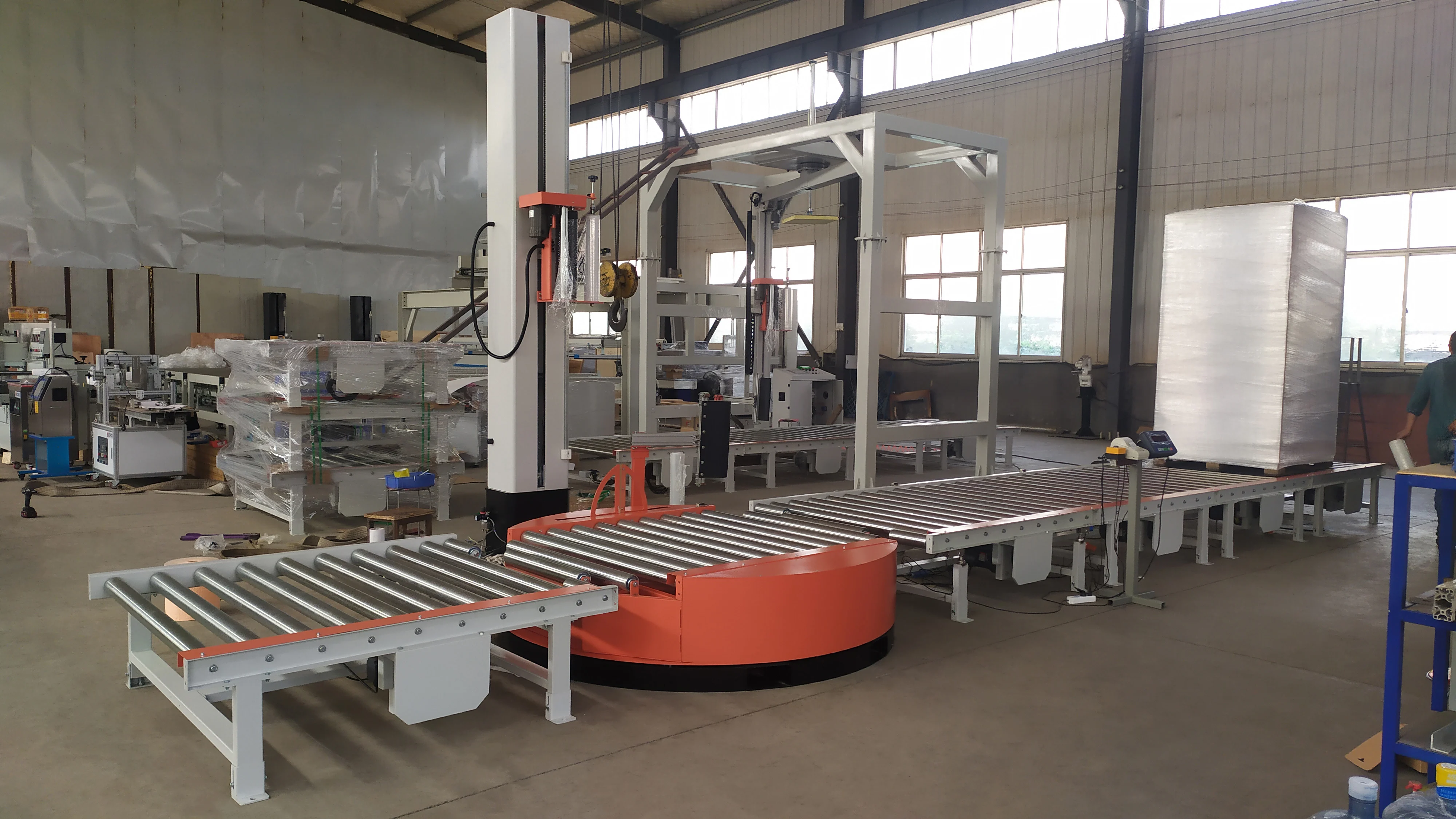 UCR-T2000A Conveyorized Automatic Turntable Pallet Stretch Wrapping Machine
