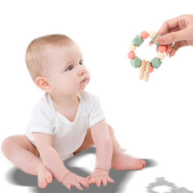 Newborn round unisex wooden teething ring senory chewable rattles toy beech cute soft infant silicone baby teether for gift