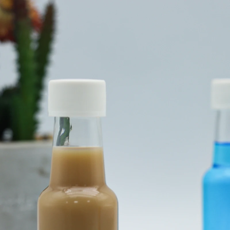 Wholesale 50ml Wine shape PET clear plastic bottle for coffee juice liquor Bottle