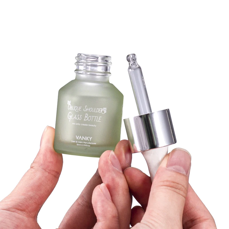 New Design Luxury 30ml 60ml 100ml Oblique Shoulder Bottle Customized Green Serum Essential Oil Dropper Glass Bottle With Pump