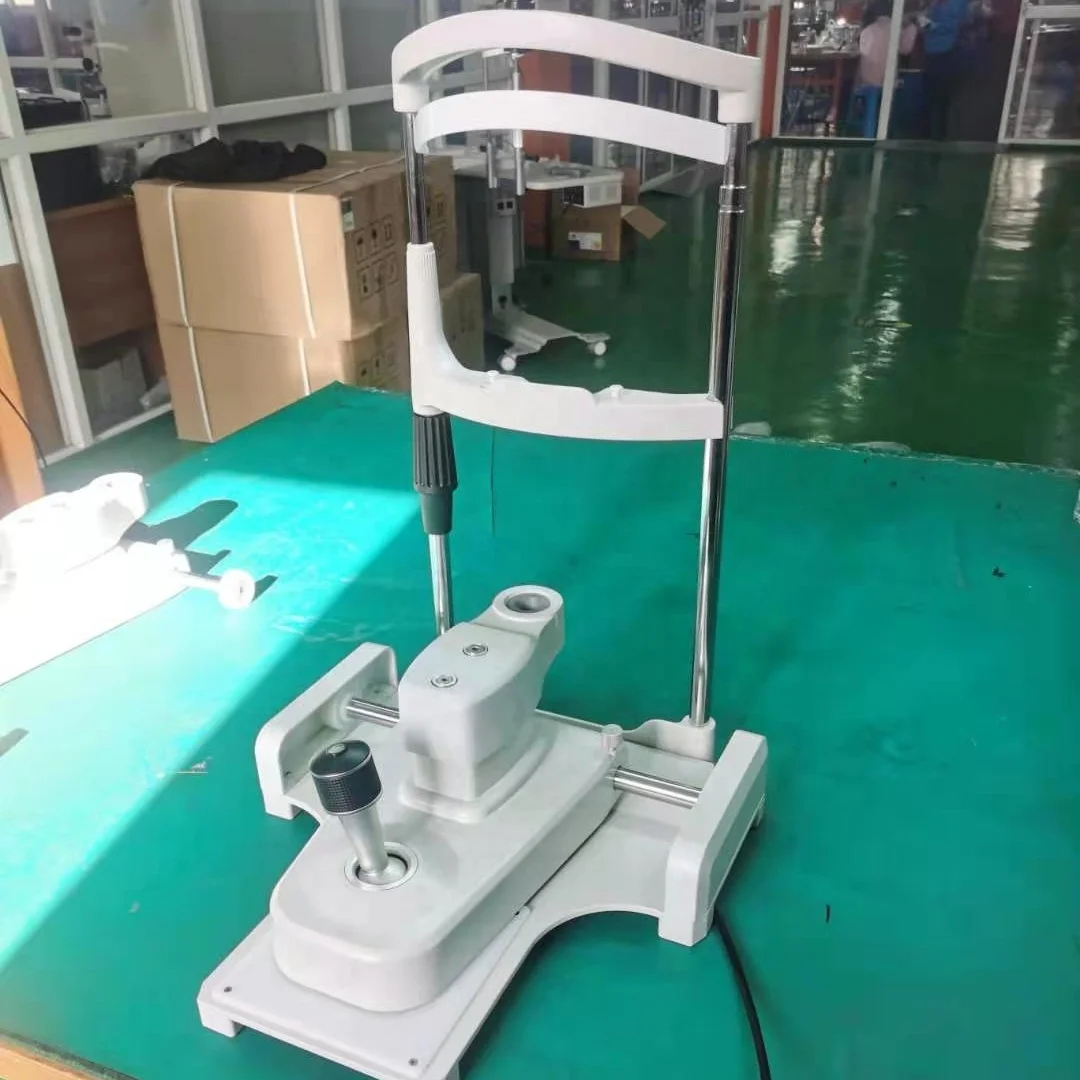 metal base with chin rest from slit lamp with joystick