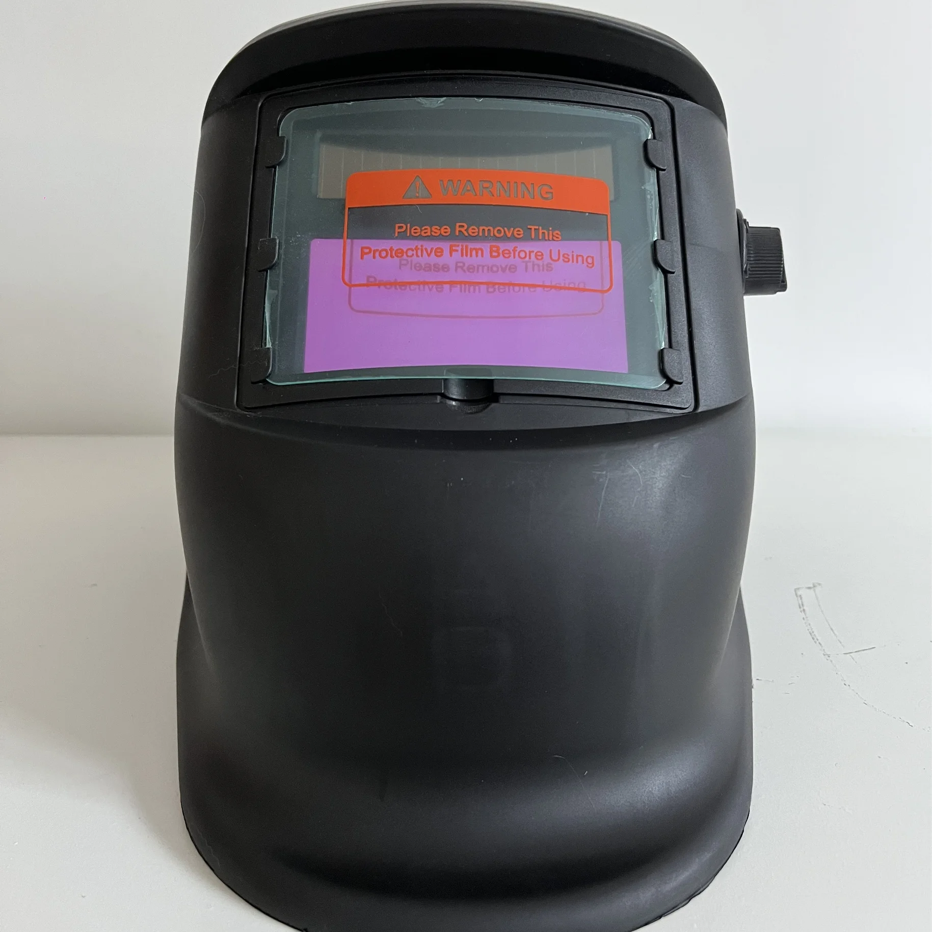 Self darkening welding helmet