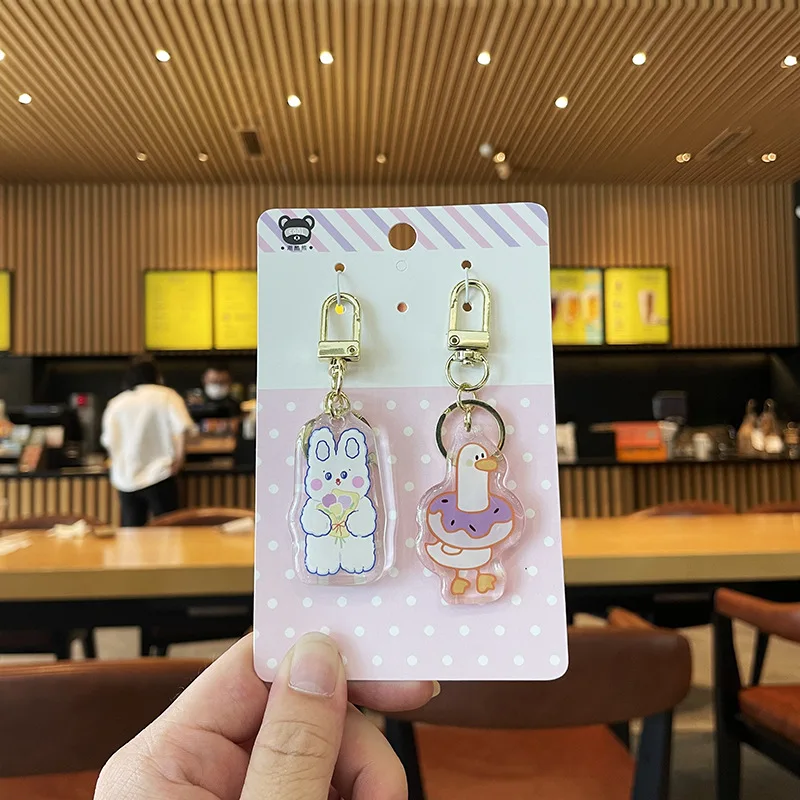 Manufacturer custom cartoon acrylic charms clear transparent acrylic keychains with back card