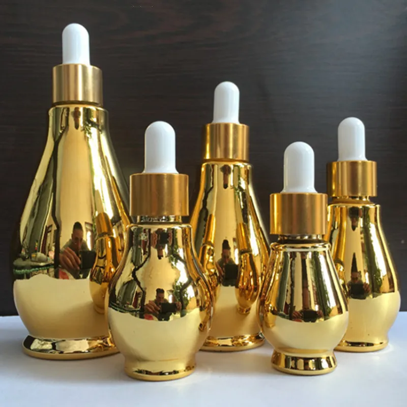 Cosmetic packaging luxury serum dropper bottle 15ml 30ml 50ml 100ml gold color 1 oz electroplating essential oil glass bottle
