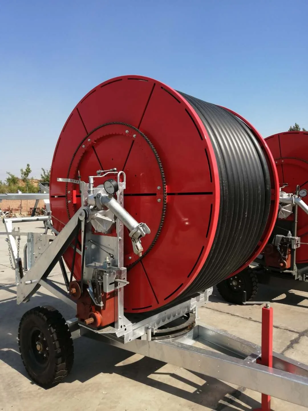 
Hose reel irrigation machine with travelling big rain gun sprinkler for farmland 