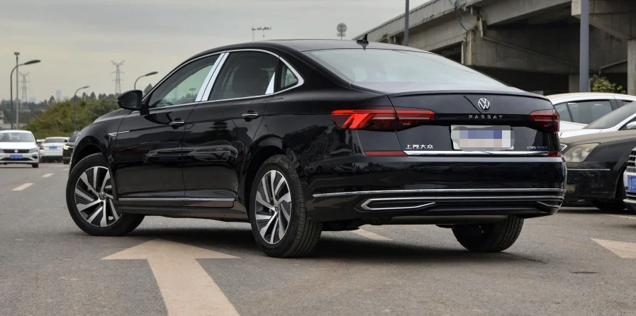 A brand-new export of black hybrid used cars driving at high speed EV