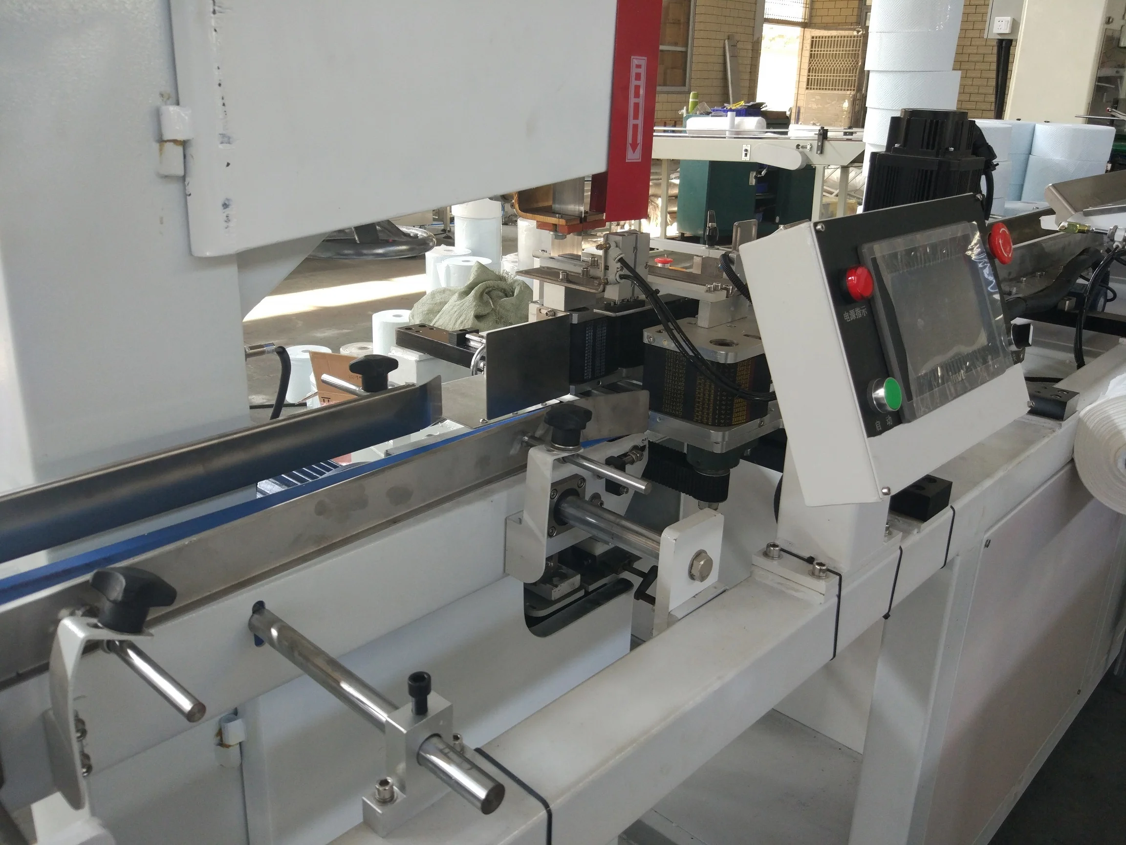 China factory direct sell auto cutter machinery toilet bathroom kitchen towel tissue paper roll band saw cutting machine