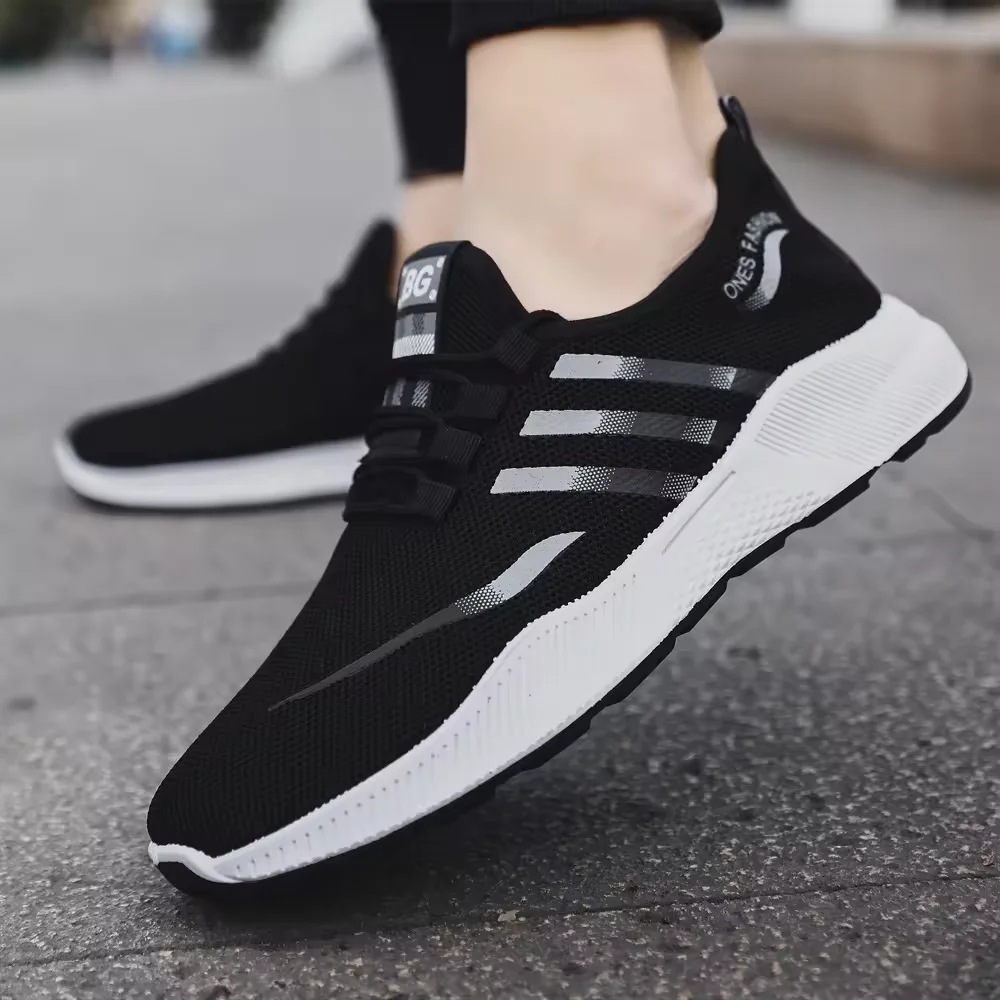 KUNTAI soft trainers for boys fashion trend shoes light weight flat shoes men anti-slip soles cheap stock sneakers wholesale