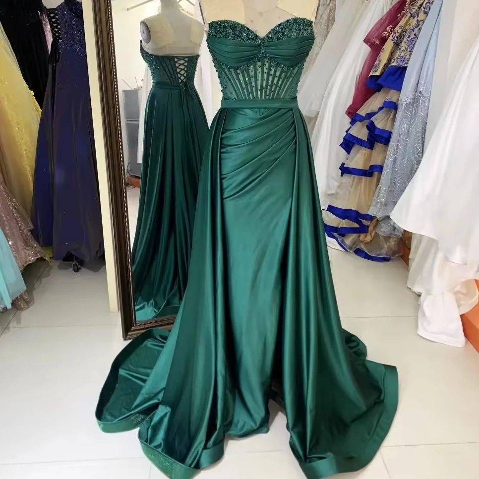 2024 see through corset emerald green sleeveless beading hand pleated mermaid prom evening dresses with overskirt