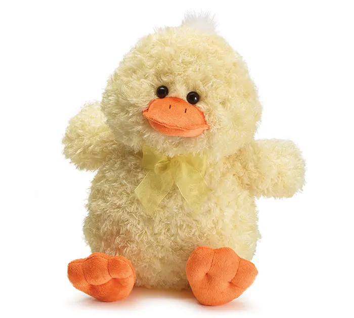 Customized baby shower gifts sit yellow duck