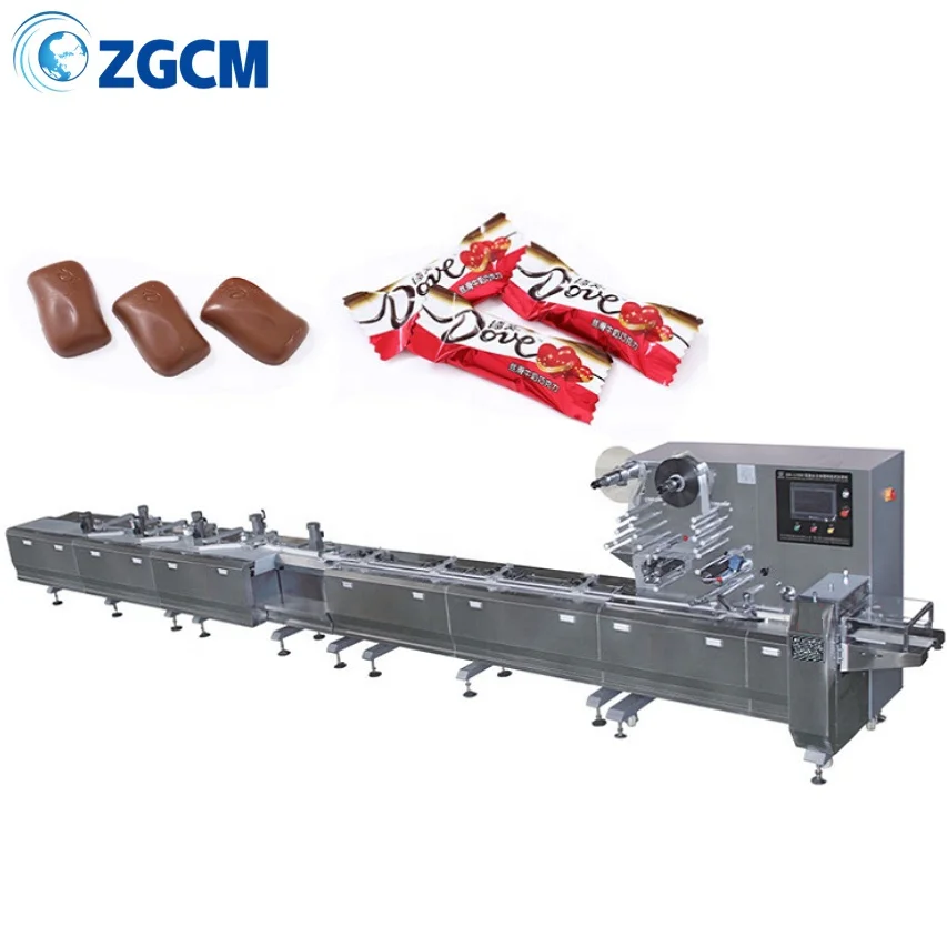 Automatic feeding chocolate candy packing machine Automatic horizontal pillow tray feeding packaging machine