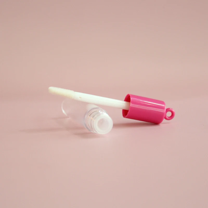 Custom logo empty pink lipgloss tube with round keychain lip gloss containers with wand for cosmetic tube