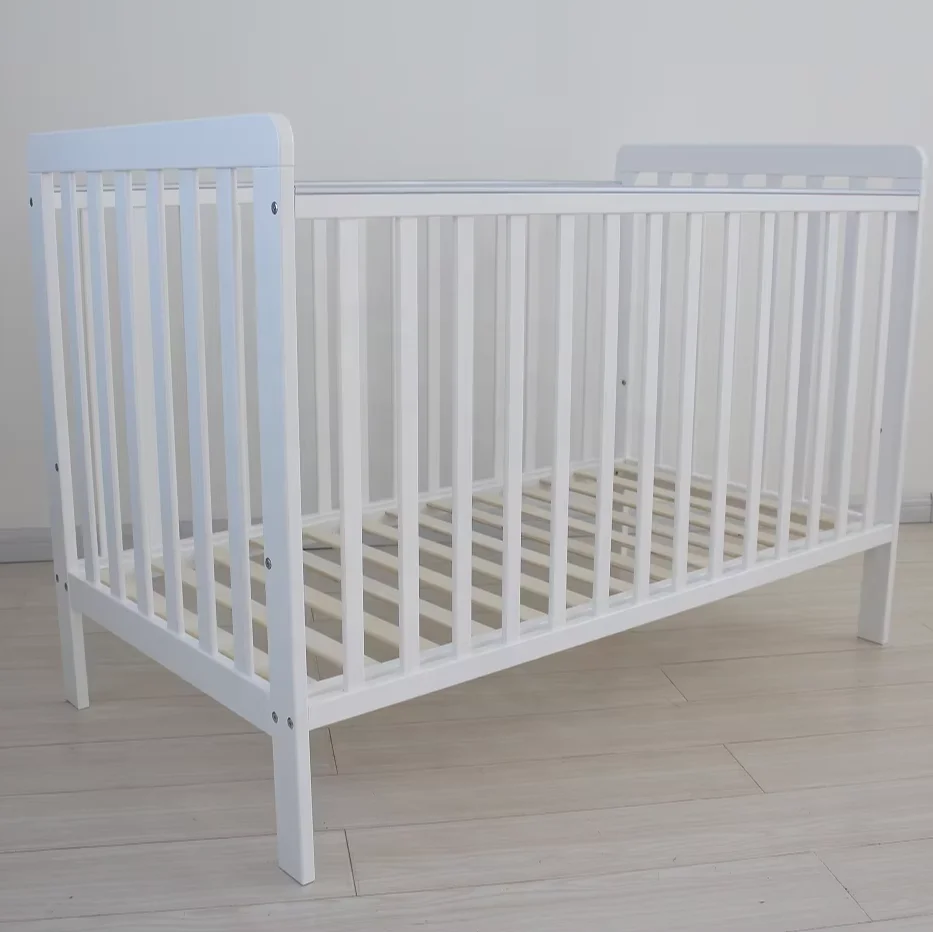 Baby white compact cot with Adjustable Height cot base