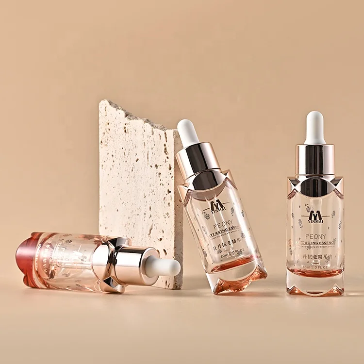Luxury 30ml rose pink custom Empty Round Essential Oil Dropper Glass Cosmetic Serum Bottle with rose gold dropper