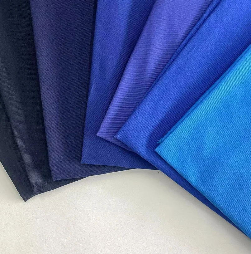 Stock lot soft 100 cotton yarn card 128 * 60 twill cotton fabric Acid alkali resistant for pants Suit casual wear /bedding