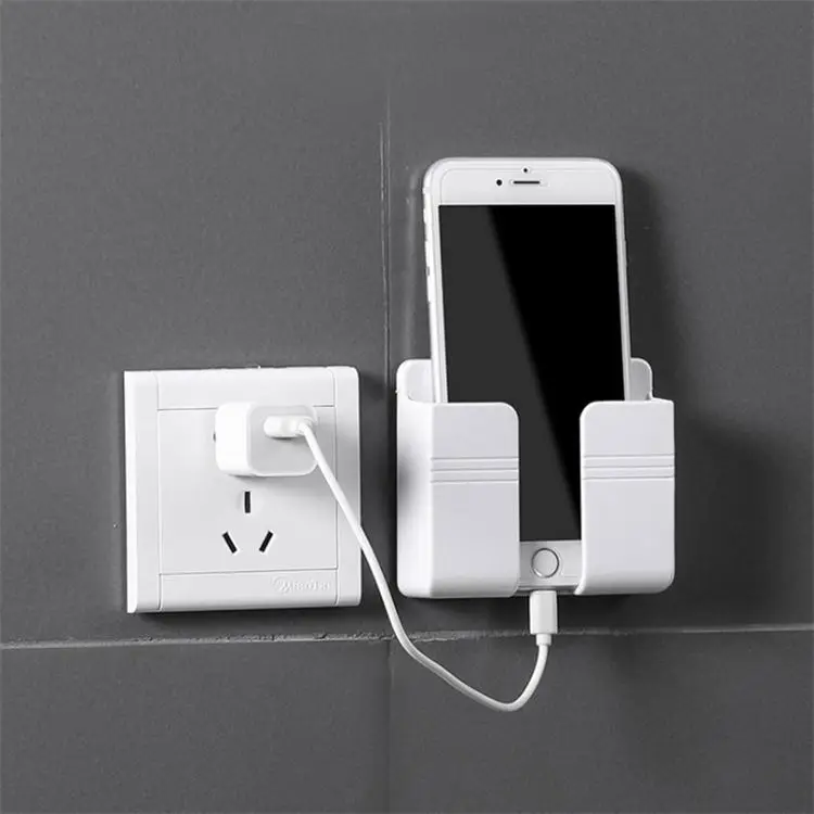 New Popular Stock Multifunction New Wall Phone Holder Adhesive Mobile Phone Wall Charger Holder And Remote Control Stand