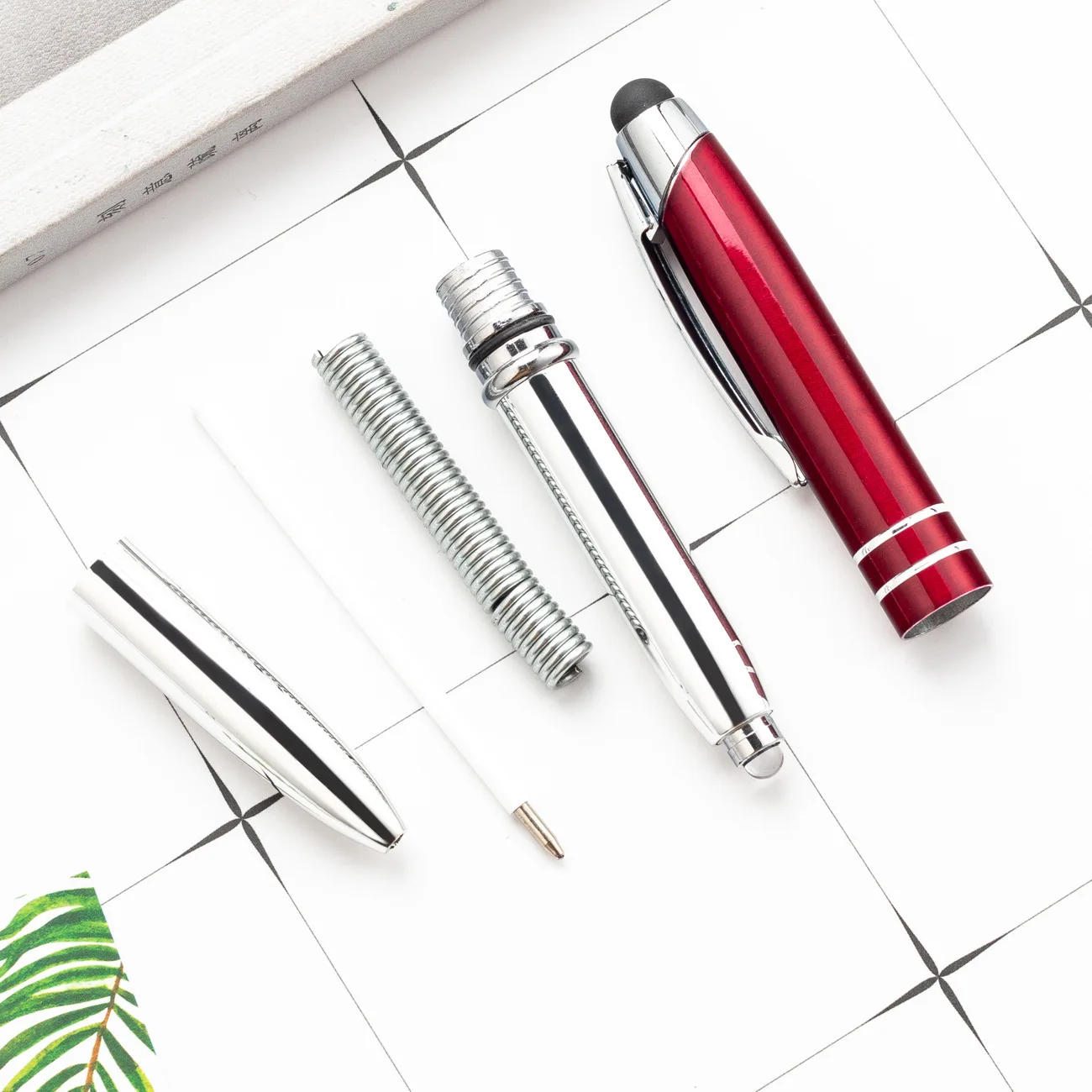 Wholesale the 3- in -1 LED Light Stylus Metal Ballpoint Pen With Multi-Functional Custom Logo Laser Printed For Hotel Gift