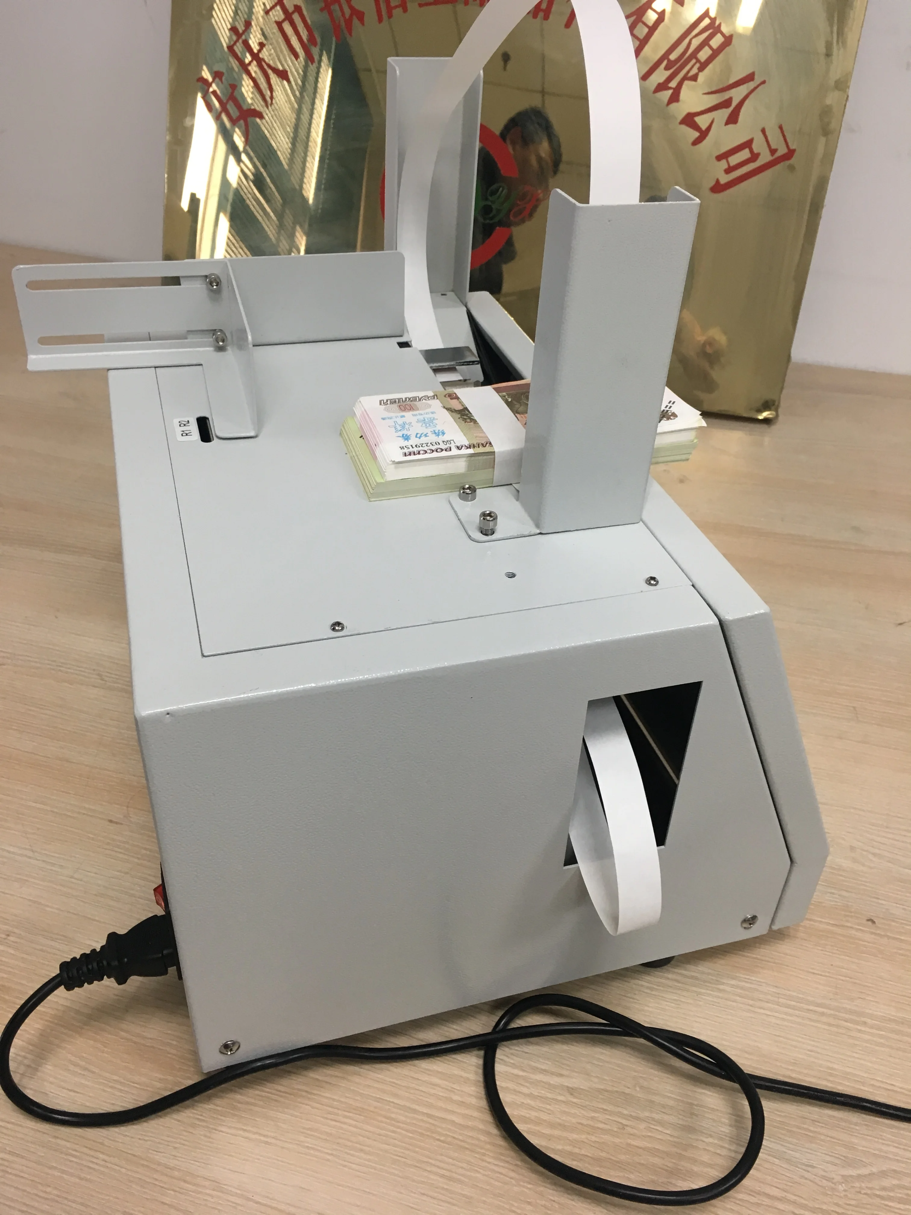 Automatic paper packaging machine banding cash money notes machine hot melt strapping tape machine
