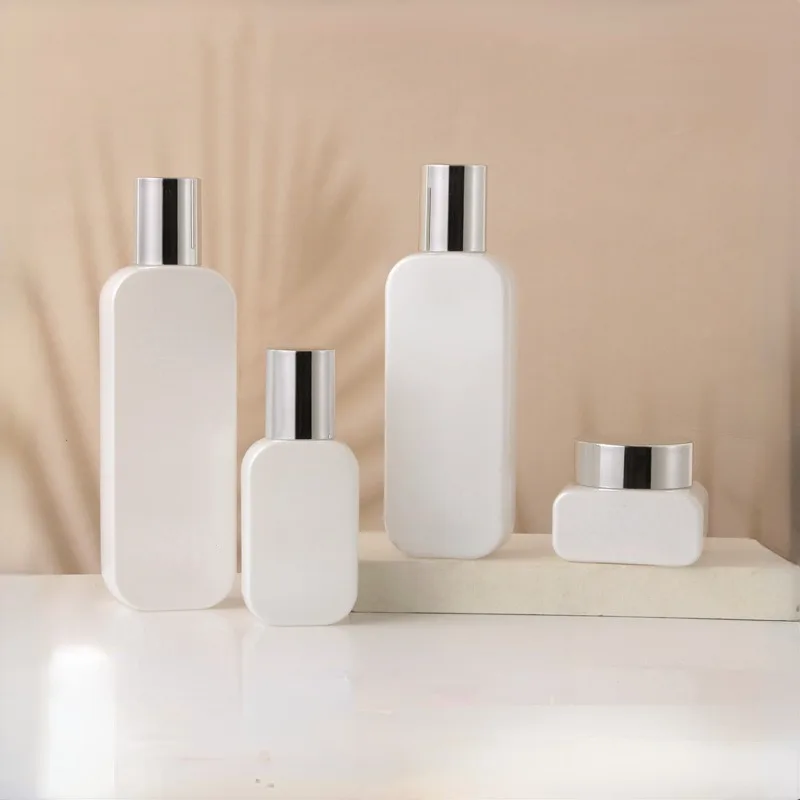 Wholesale cosmetic packaging container frosted skincare set bottle glass face cream jar with bamboo lid