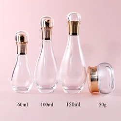 Idealpak Custom High End Gold Luxury Cosmetics Container Glass Bottle Set Glass Bottles Manufacturers with Logo