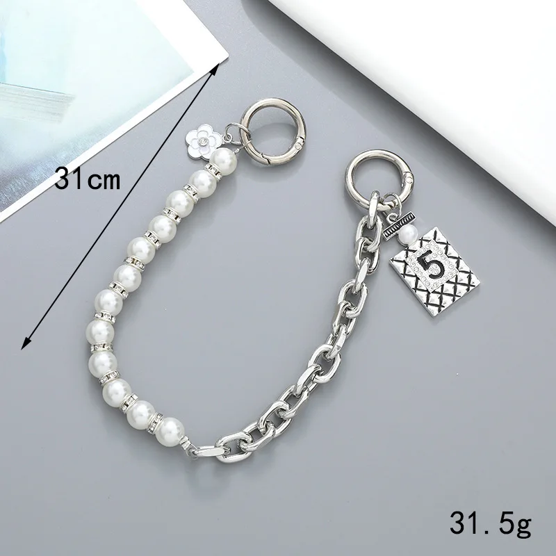 2024 Chain Link Fence Machine Gold Cuban Link  Gold Chain Plush Key  Waist   Pearl Handle Bags Chains Factory Offer