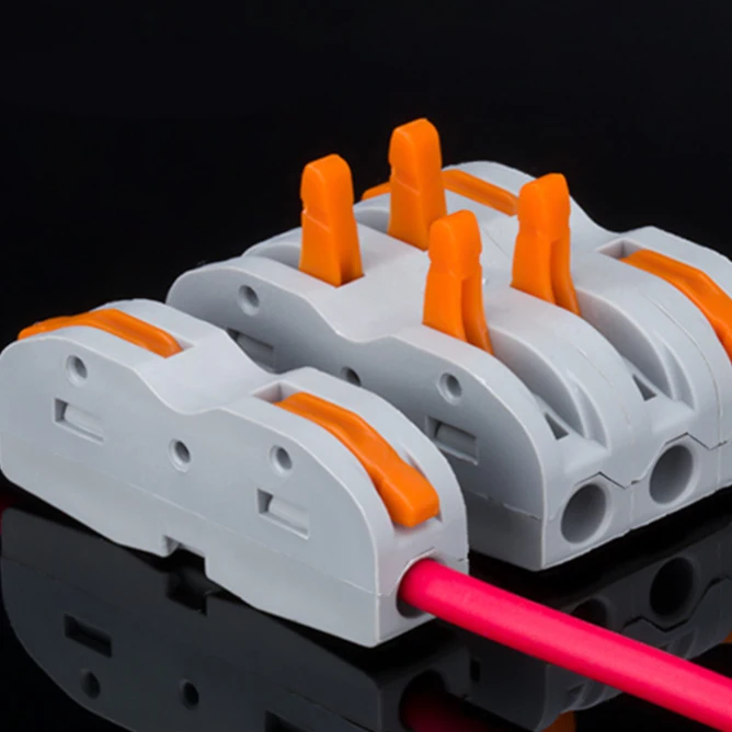 SUPLIN STITCHES THE 1 WIRE CONNECTOR TO THE TERMINAL QUICK CONNECTOR LUMINAIRE CONNECTOR