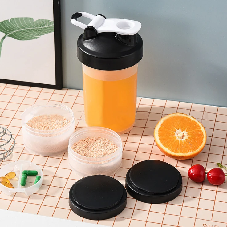 Wholesale 600ml plastic eco friendly protein shaker water bottle with pill container shaker bottle Custom Logo With Mixer Ball