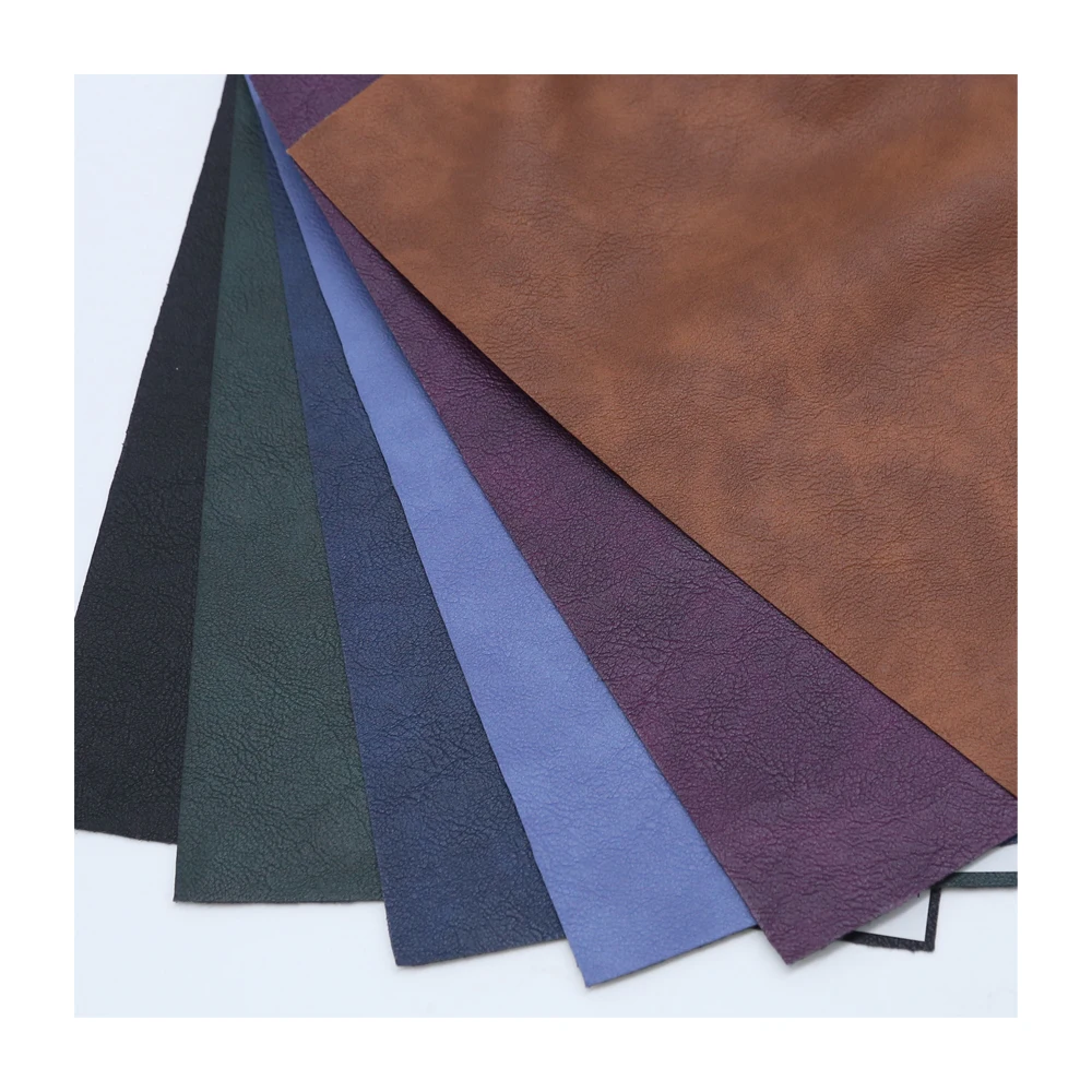 Wholesale Custom Multi Color 0.6MM Embossing Stretch Backing PU Synthetic Leather For Making Garments