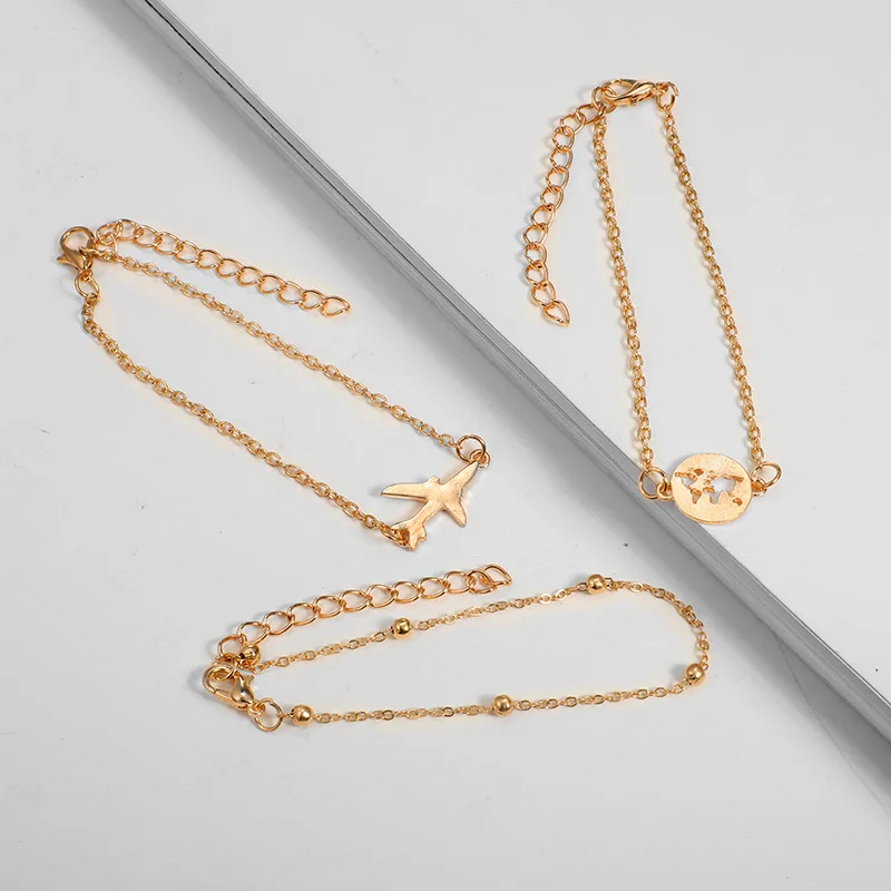 
Wholesale and retail European and American metal shell conch aircraft globe map round bracelet six - piece set 