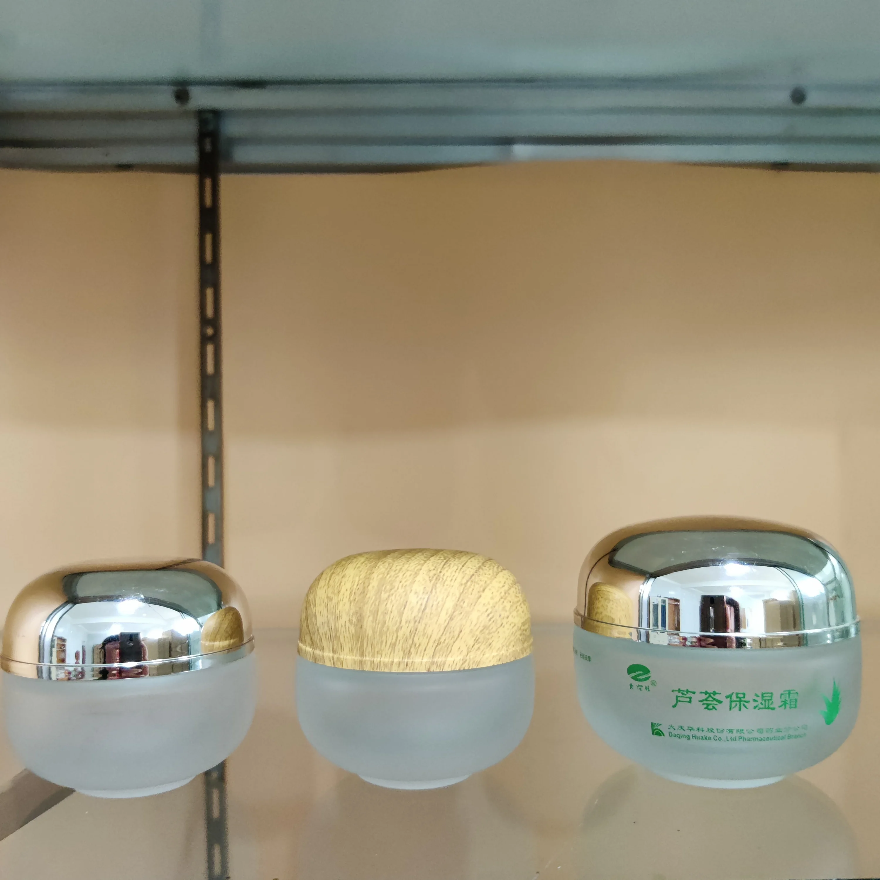 cosmetic packaging 50ml U shape foundation lotion clear flat glass bottle with silver pump