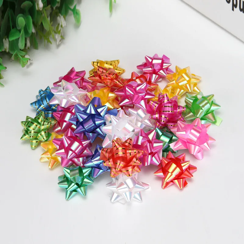 Разноцветные ленты с бантом в виде звезд для подарочной упаковки