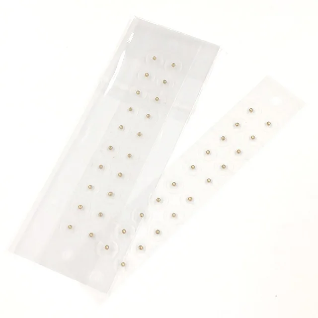 Magnetic balls ear seeds gold plated clear package
