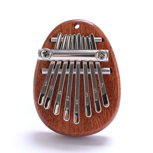 Качественное музыкальное мини-пианино kalimba на 8 клавиш