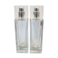 Transparent 50ml perfume bottles wholesale rectangular attar crystal bottle pump spray attar glass oil bottle