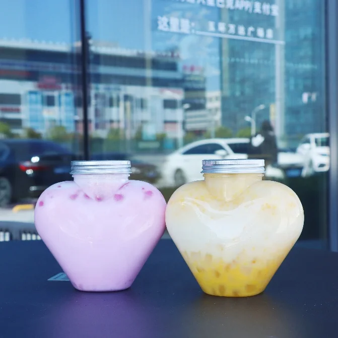 PET 500ml plastic juice bottle heart shape beverage milk bottle