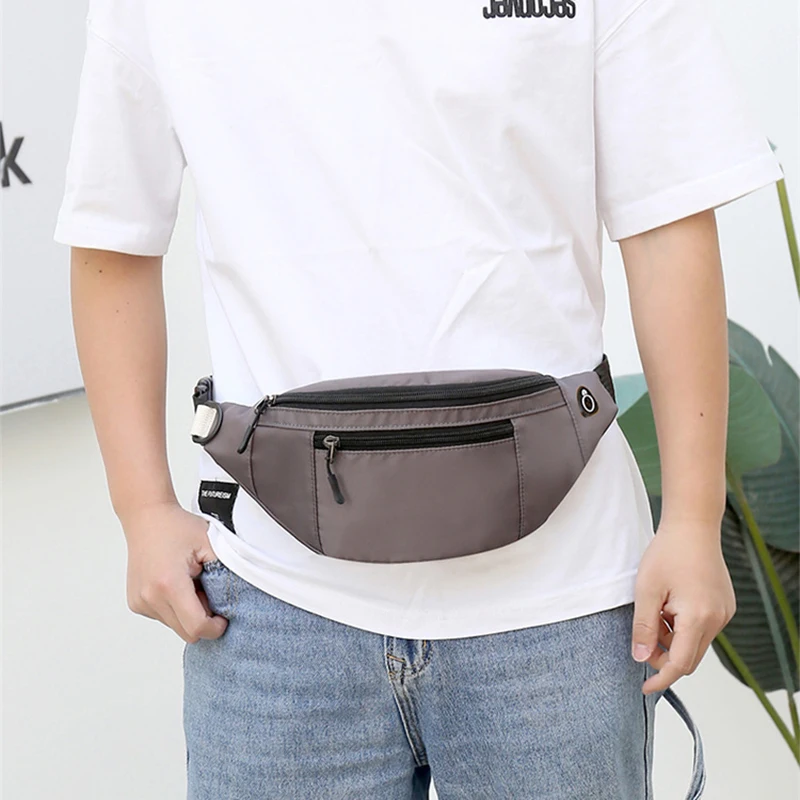 custom logo cheap unisex fanny pack wear-resistant nylon leisure fitness waist bag running bag with earphone hole