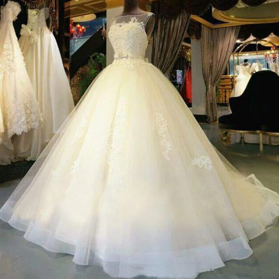 Beautiful A-Line Sleeveless Tulle Wedding Dresses Illusion Neckline Appliques Elegant Bridal Gowns Custom Made Court Train