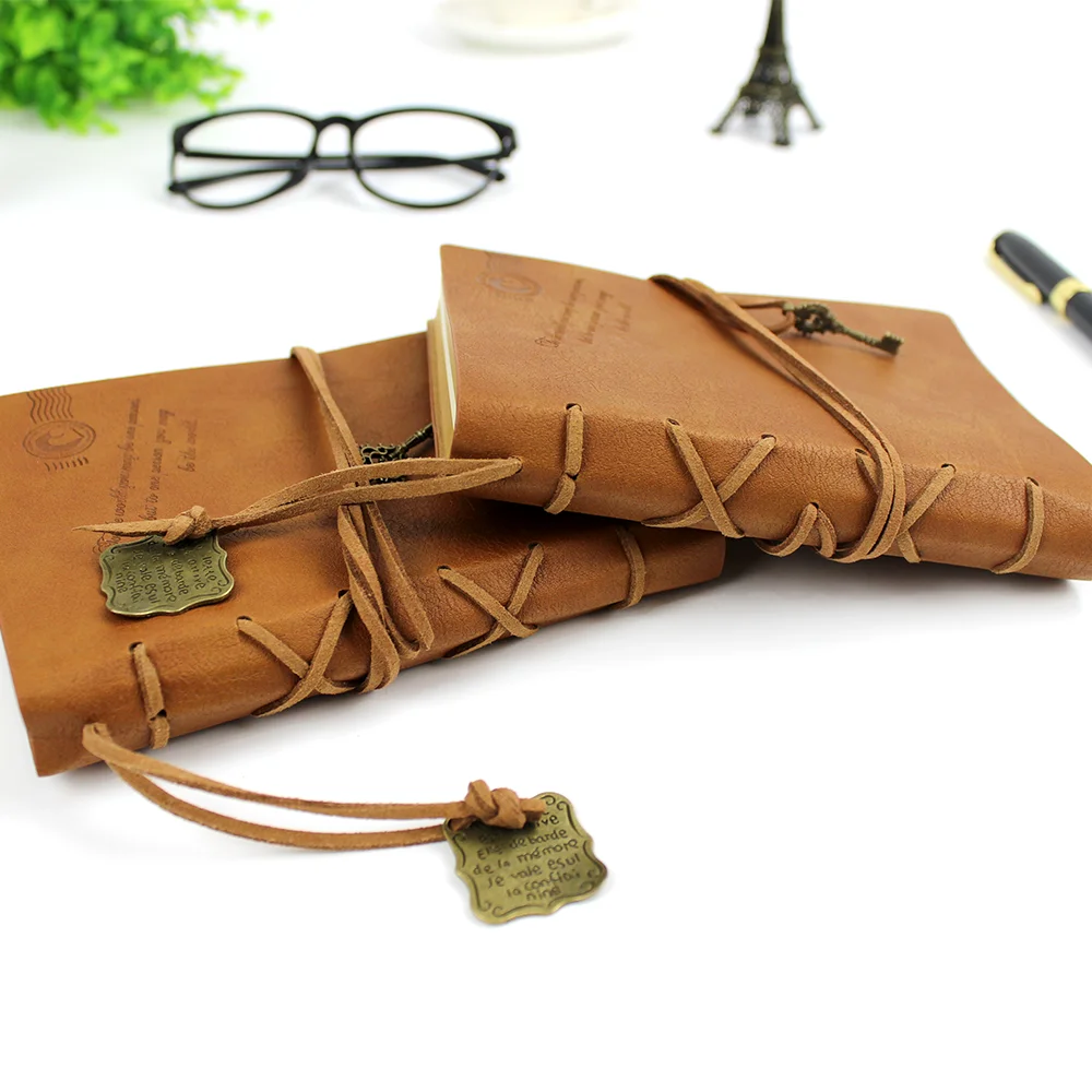 Custom Journal Faux Vintage Travel Dairy Notebook A7 PU Cover Blank Kraft Paper Leather Diaries With Pendant