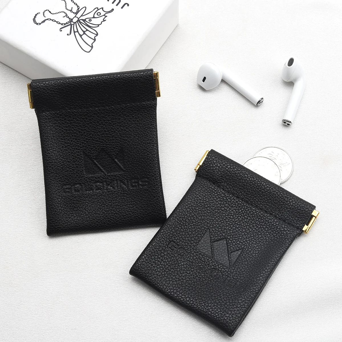 Custom Emboss Logo Reusable PU Leather Black Bag For Bluetooth Headset Packaging Shrapnel Openings Leather Dust Pouch
