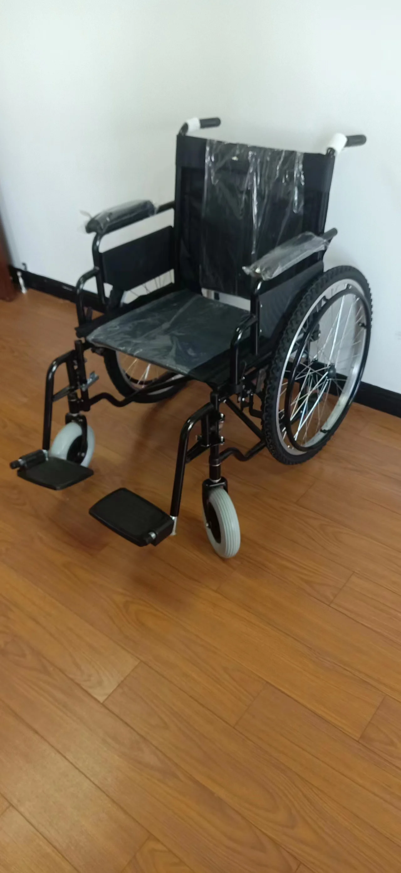 New product launched manual inflatable tire spoke wheel foldable portable wheelchair for disabled people