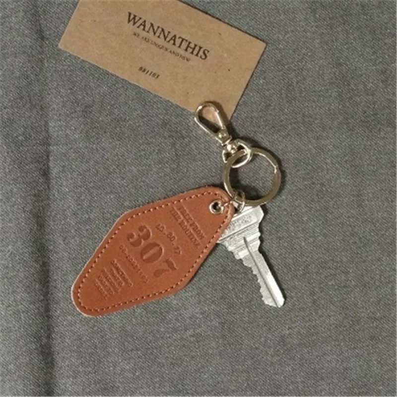 Wholesale Custom Embossed Logo Pure Color Hotel Keychain Blank PU Leather Hotel Room Keychain With Metal Hook Key Tags