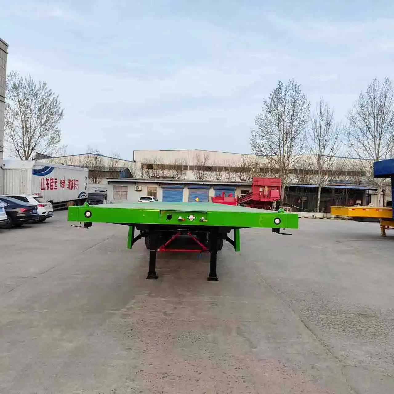 Factory supply price Flatbed Trailer 3 Axle 45FT Flat Bed Semi Trailer 40FT Container Truck 2 Axle 40FT Flatbed Trailer for Sale